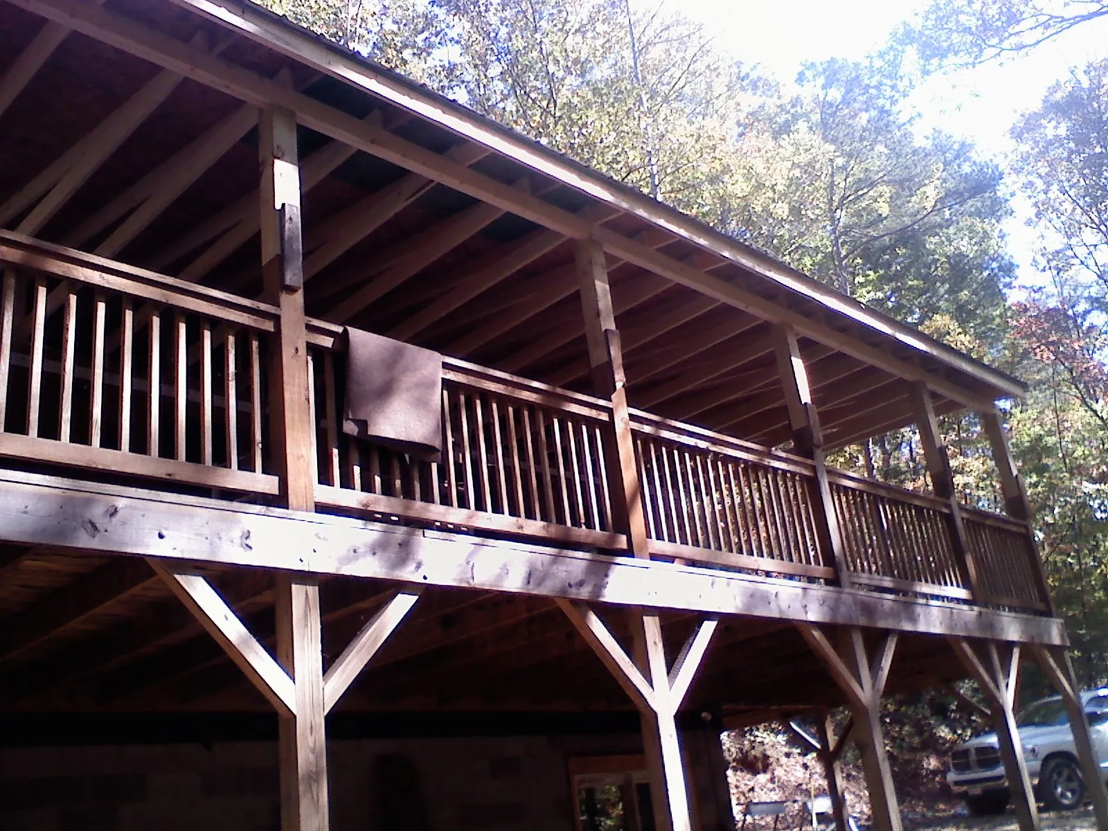 Timber framing under a new elevated porch and deck — Roof Leak Repair in Sumter by Roofing Brothers